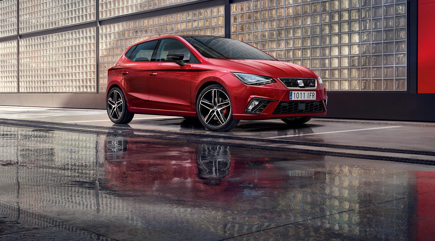 New SEAT Ibiza lateral view red background