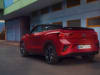 1-TC0915-t-roc-cabrio-exterior-red-back-side-view