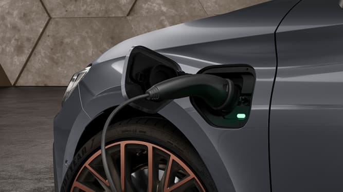 new-cupra-leon-sportstourer-ehybrid-family-sports-car-in-rodium-grey-closeup-view-of-charging-plug-for-emission-free-driving